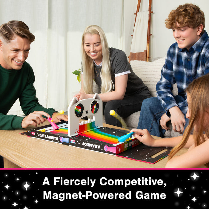 People playing Cat & Mouth, a fiercely competitive magnet-powered game