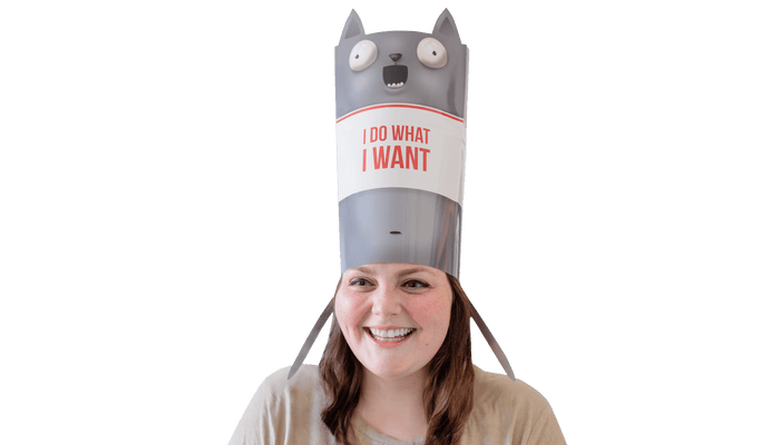 A smiling woman wearing the Barking Kittens wearable cat crown reading 'I do what I want'