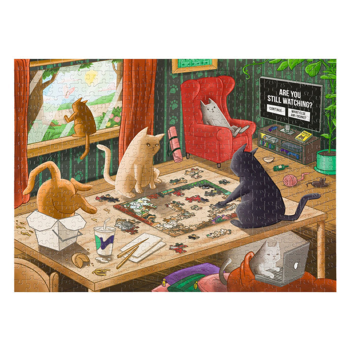 The assembled Cats in Quarantine puzzle showing cats doing a jigsaw