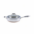 Stainless steel frying pan with lid on a white background