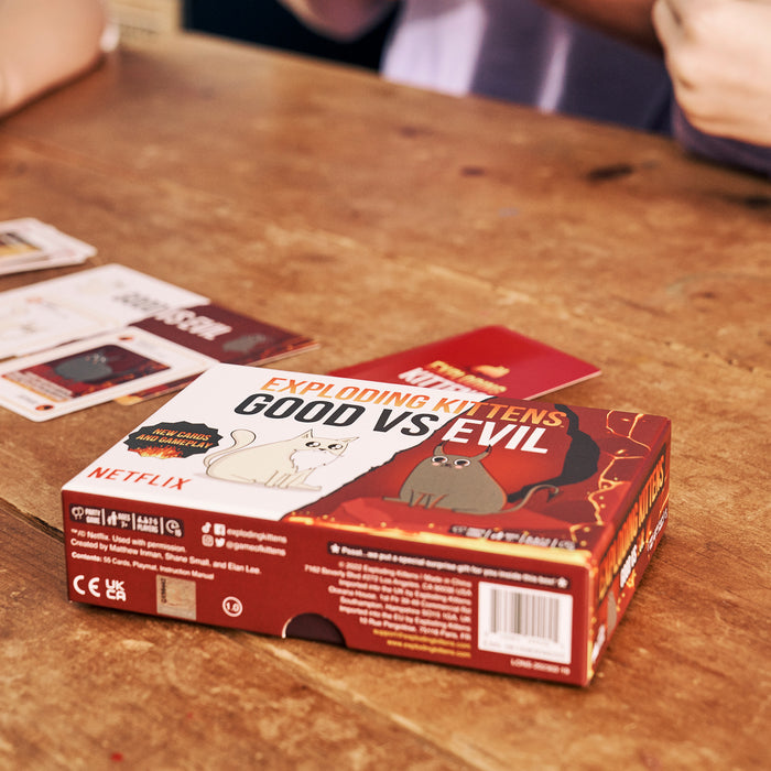 Exploding Kittens Good vs Evil box on a table