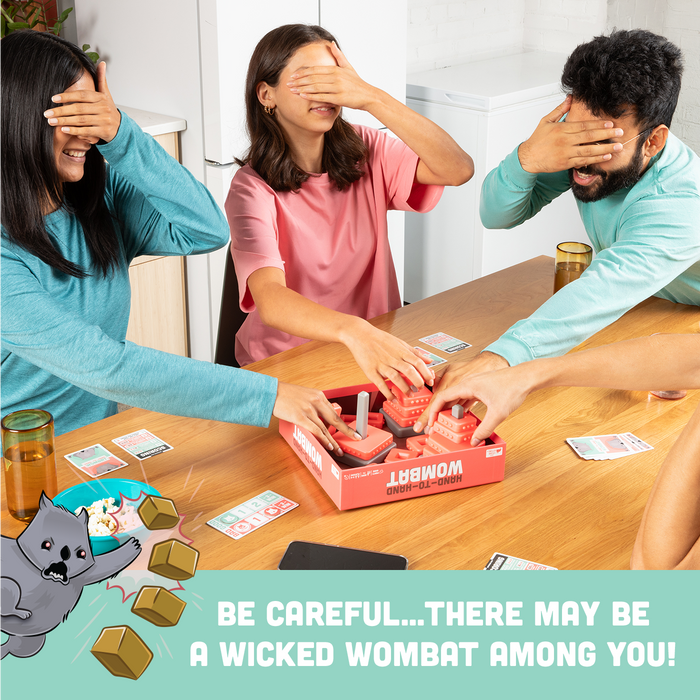 People playing Hand-To-Hand Wombat with eyes closed, building towers
