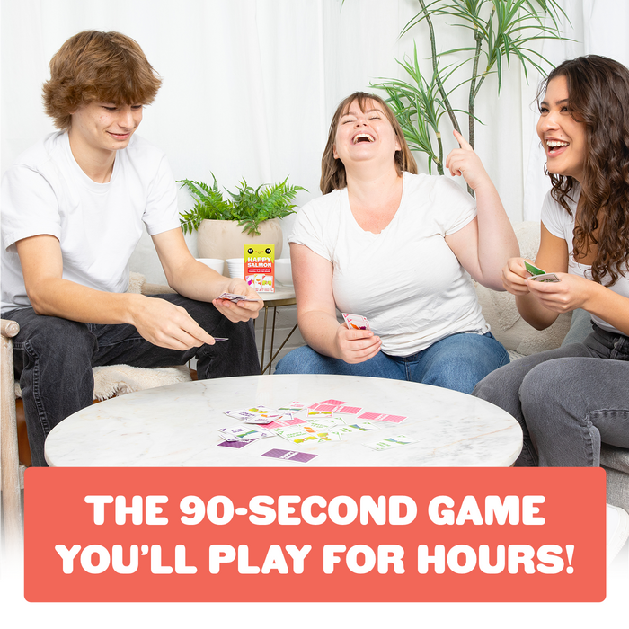 Kids playing Happy Salmon at a table