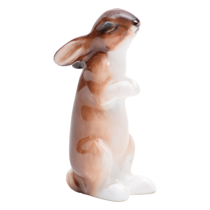 Hare seated, ears down