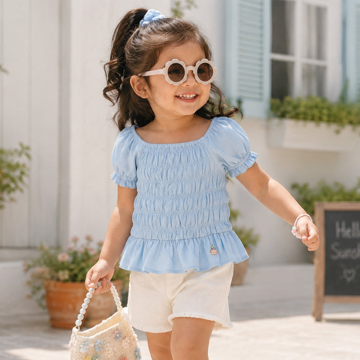 Kids Girls Top in Light Blue with Smocked Fit and Puff Sleeves for Summer Casual Styling