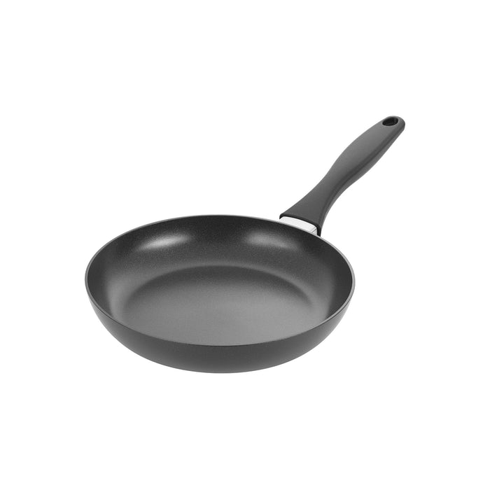 Black frying pan on a white background