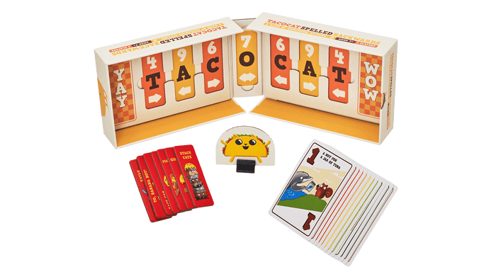 Tacocat Spelled Backwards contents: a foldout board, dice, and cards